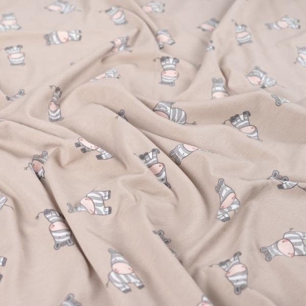 Baumwolljersey in Sand mit Zebra, Stoff in ganzer Breite